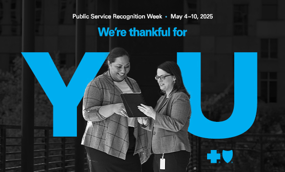 Two female office employees. Text overlay reads "We're thankful for you" with Blue Cross Blue Shield branding, highlighting Public Service Recognition Week, May 4-10,2025.