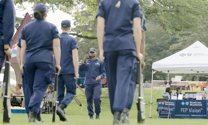  Military members participating in an outdoor wellness event.