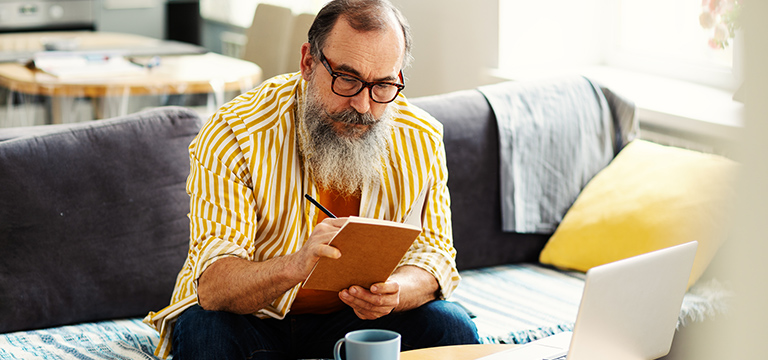 Man sitting and planning his budget