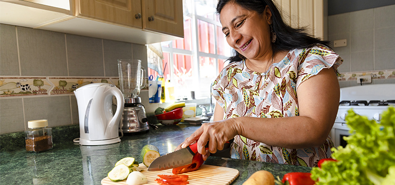 Woman cutting vegetables